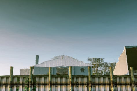 compression of short tele-photo lenses