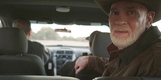 Walker Bonham in police car after Denise accuses him of murder. Walker Bonham in police car after Denise accuses him of murder.