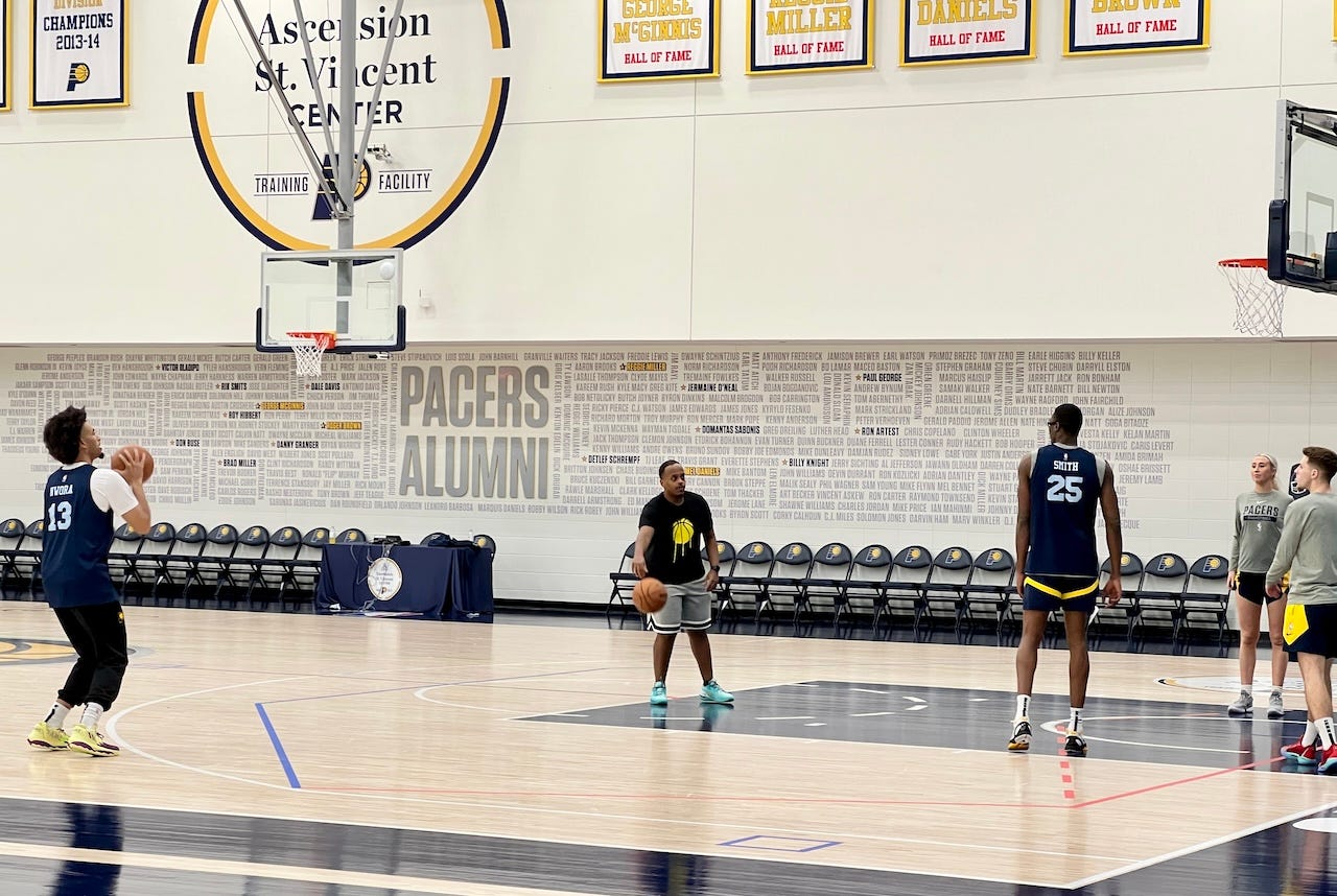 Jordan Nwora and Jalen Smith shooting after practice on Saturday.