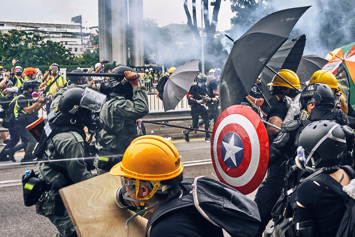 Protestors outside of the Yuen Long Police Station, expressing their distrust and displeasure with how the police responded to the triad attacks at the Yuen Long West Rail Train Station. Yuen Long, New Territories, Hong Kong. July 27th, 2019.