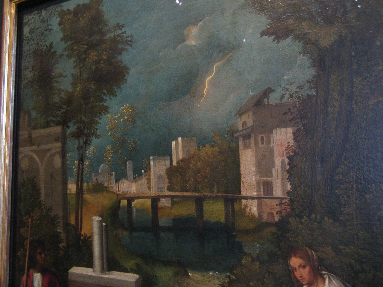 A soldier and a nursing mother under a lightning split sky