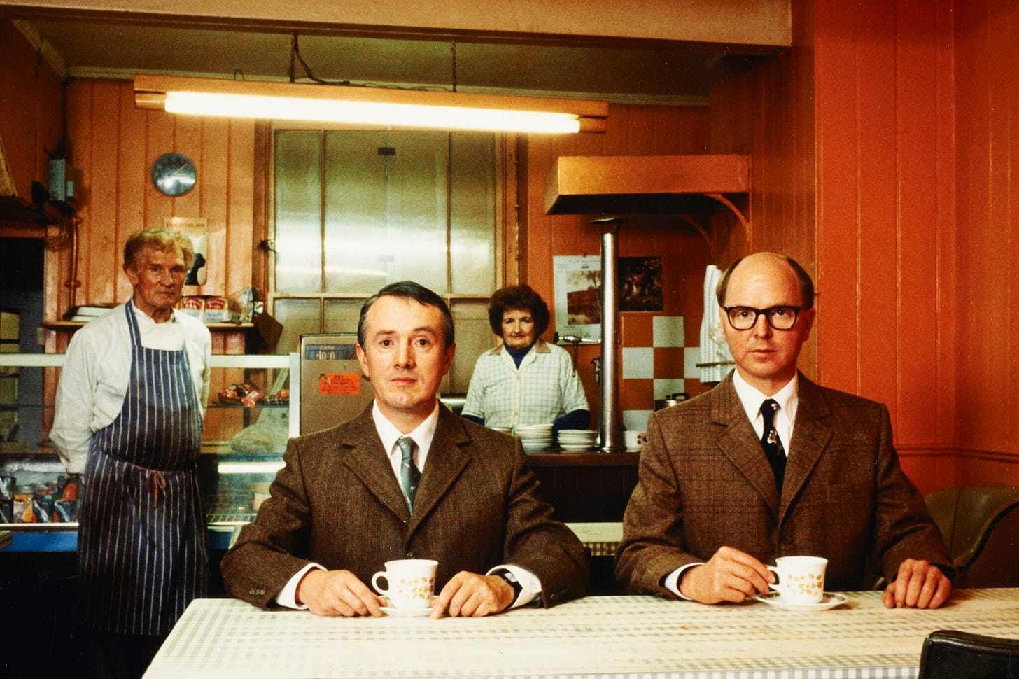 https://gilbertandgeorgecentre.org/wp-content/uploads/2023/07/At-Market-Cafe-on-Fournier-Street-2048x1365.jpeg