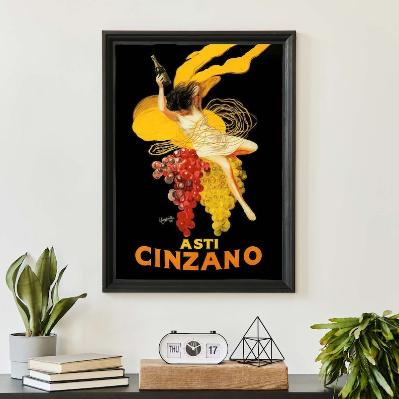 May include: A vintage poster advertising Asti Cinzano wine. The poster features a woman in a yellow dress holding a bottle of wine and standing on a bunch of grapes. The text on the poster reads 'Asti Cinzano'.