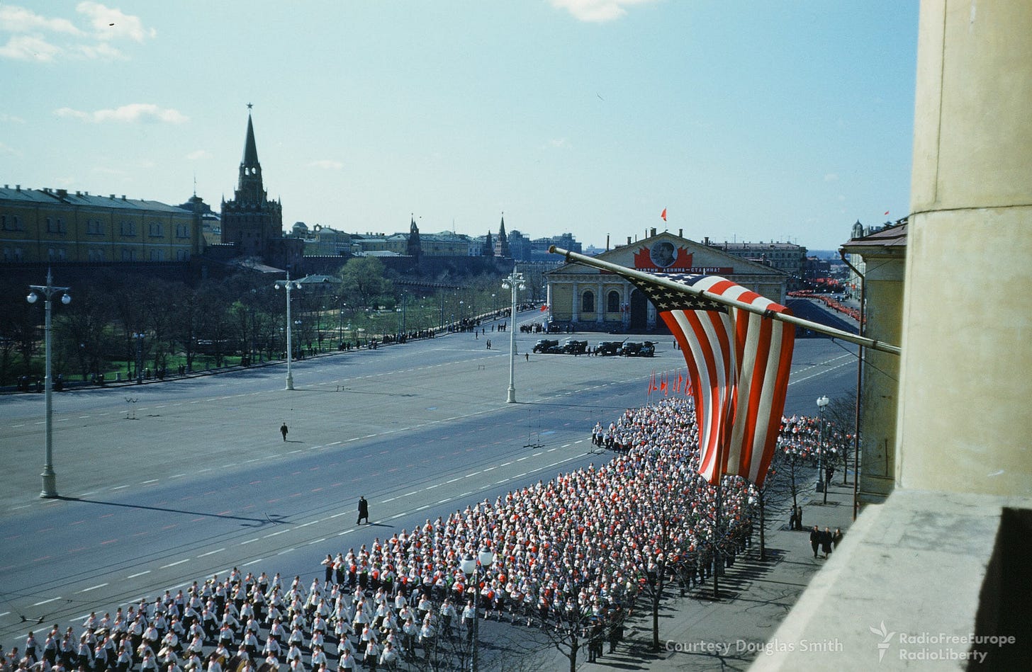 A public parade marches boldly in front of the former U.S. Embassy building on Manezhnaya ploshchad, Moscow, a Cold War era spectacle. A public parade marches boldly in front of the former U.S. Embassy building on Manezhnaya ploshchad, Moscow, a Cold War era spectacle.