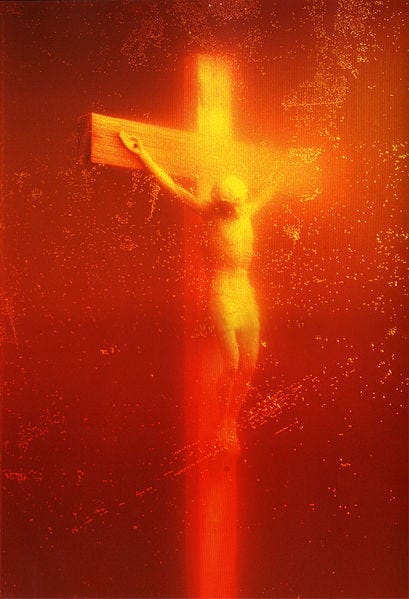 409px-Piss_Christ_by_Serrano_Andres_(1987) 409px-Piss_Christ_by_Serrano_Andres_(1987)