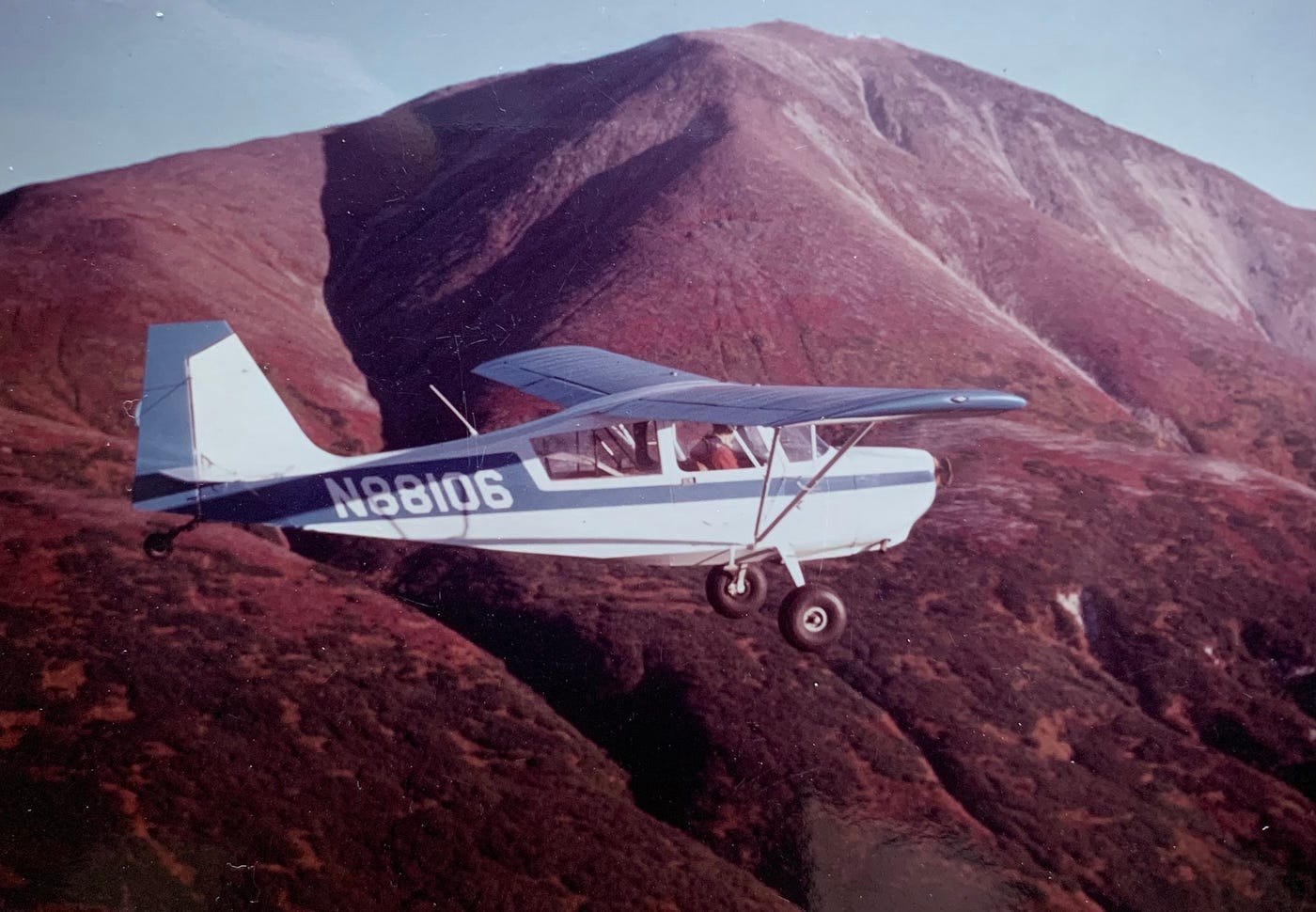 The author pictures himself piloting a private plane.