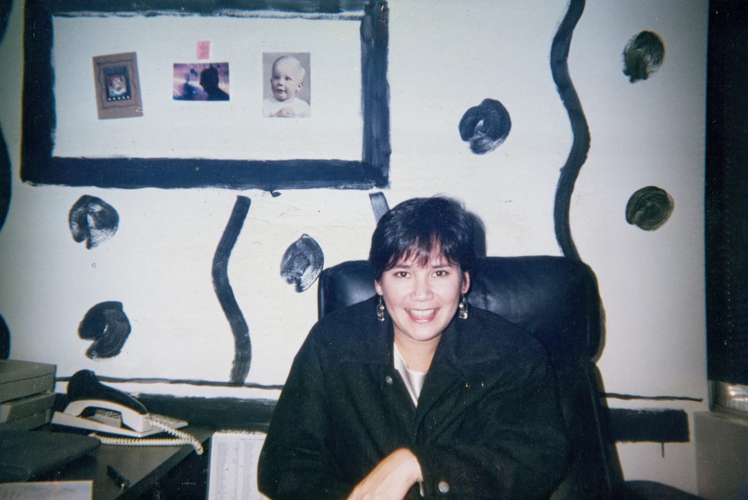 Laverne sitting in an office setting.