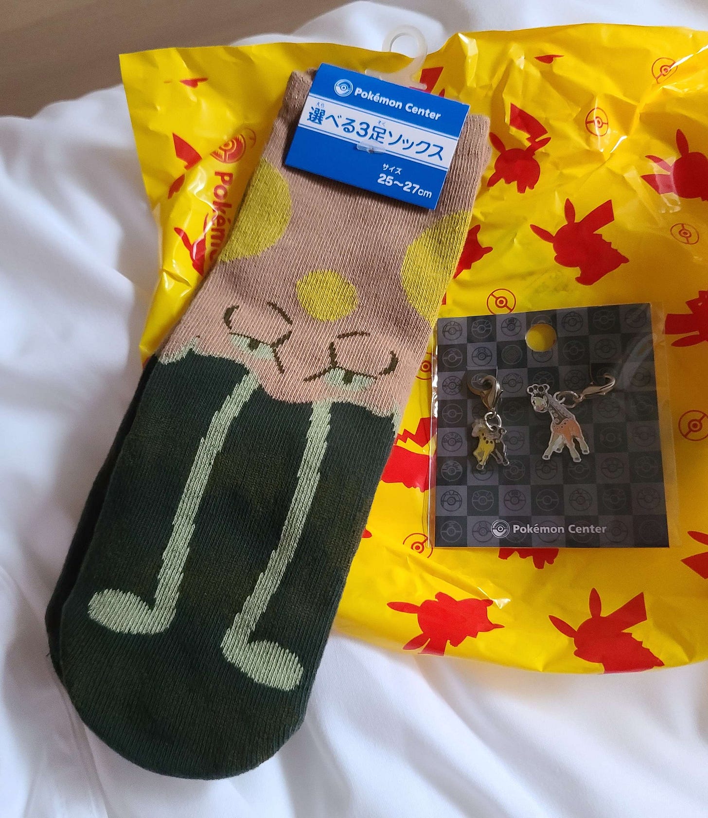 While the Girafarig / Farigiraf keychains are fantastic, i'm a huge fan of the Toedscool socks