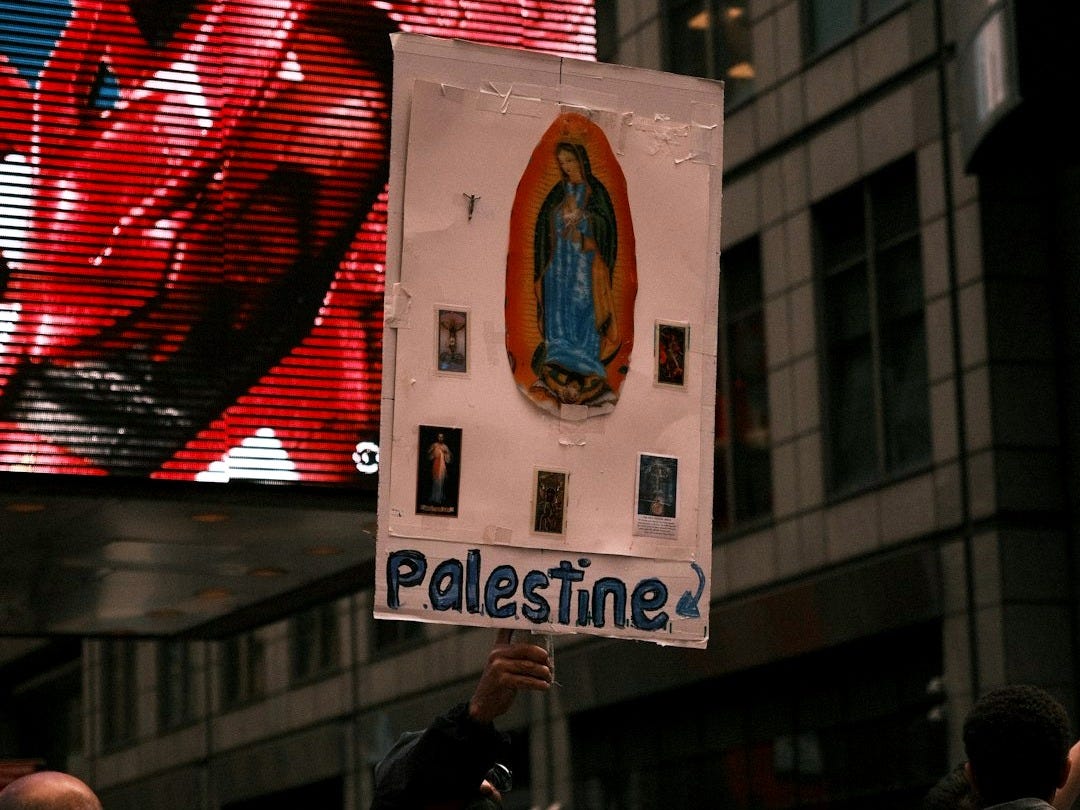 a person holding a sign in front of a building a person holding a sign in front of a building