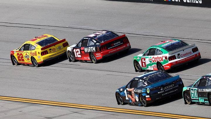 Apr 26, 2026; Talladega, Alabama, USA; NASCAR Cup Series driver Joey Logano (22) leads at turn three against drivers Ryan Blaney (12), Brad Keselowski (6), and Ross Chastain (1) during stage two of the Jack Links 500 NASCAR Cup Series race at Talladega Superspeedway. David Leong-Imagn Images Apr 26, 2026; Talladega, Alabama, USA; NASCAR Cup Series driver Joey Logano (22) leads at turn three against drivers Ryan Blaney (12), Brad Keselowski (6), and Ross Chastain (1) during stage two of the Jack Links 500 NASCAR Cup Series race at Talladega Superspeedway. David Leong-Imagn Images