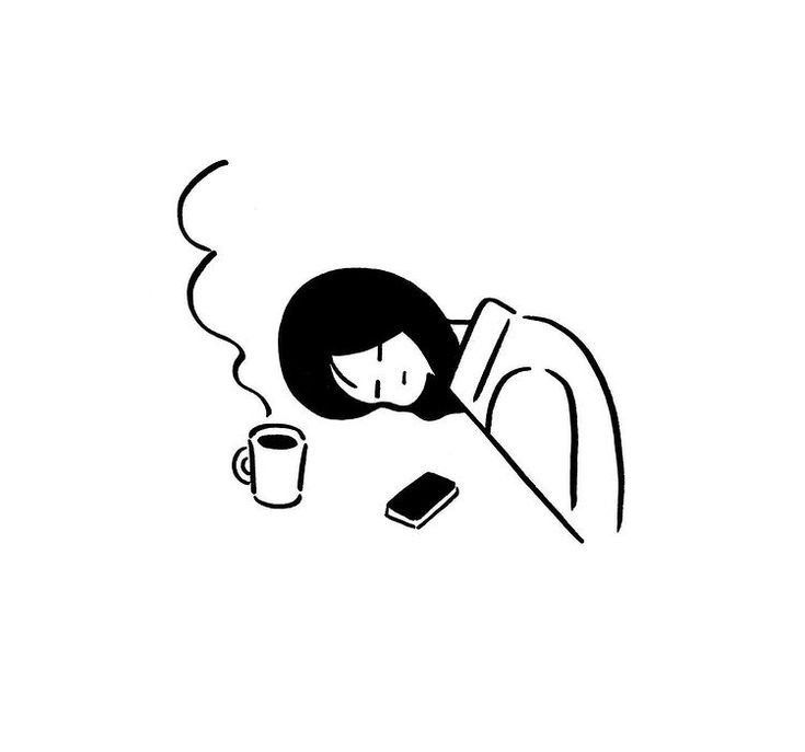 This may contain: a woman is sleeping with her head on the table next to a coffee cup and cell phone