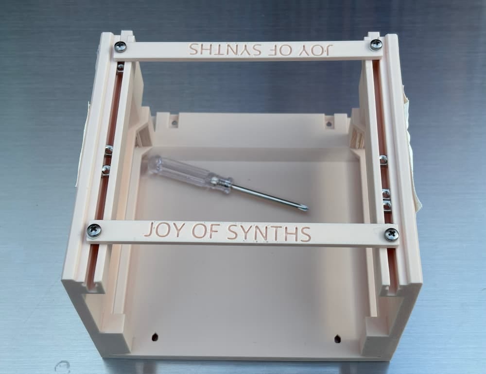 Empty 3D Printed case with words "Joy of Synths"