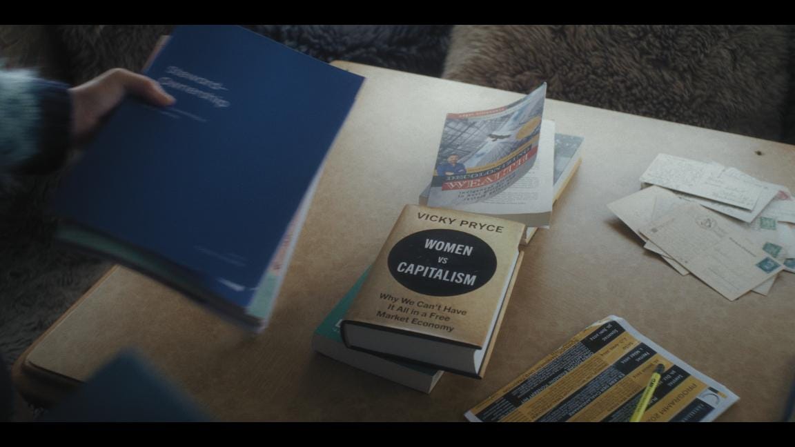 Two books, letters and pens on a table