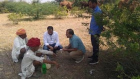 members of the Raika community interacting with researchers