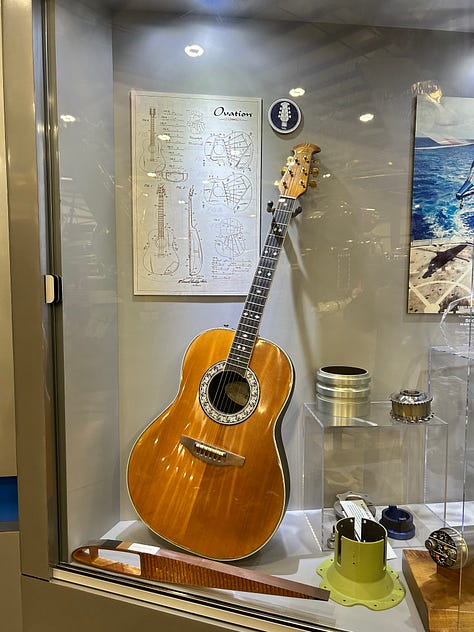 guitar, exhibit, medal, signs
