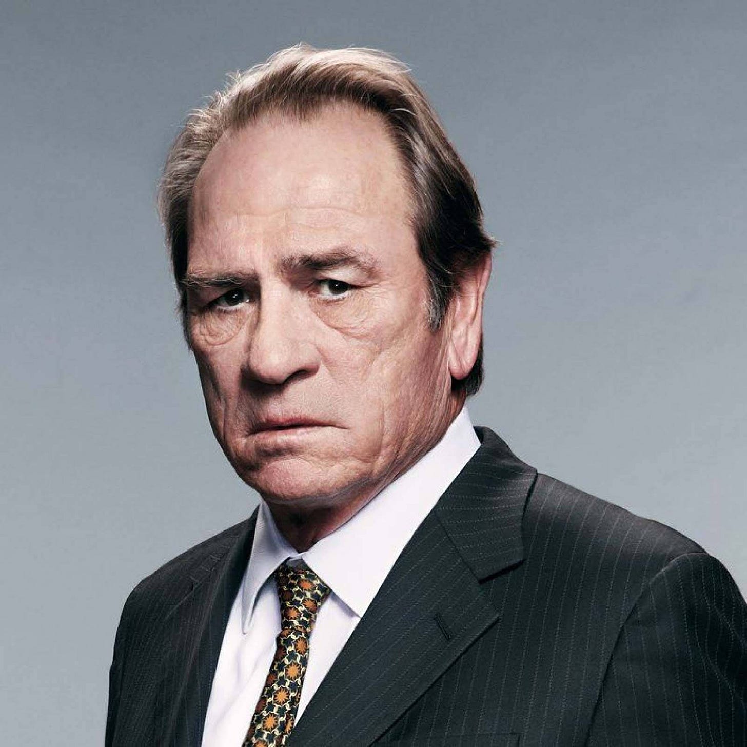Download Intense Gaze of Tommy Lee Jones Wallpaper | Wallpapers.com