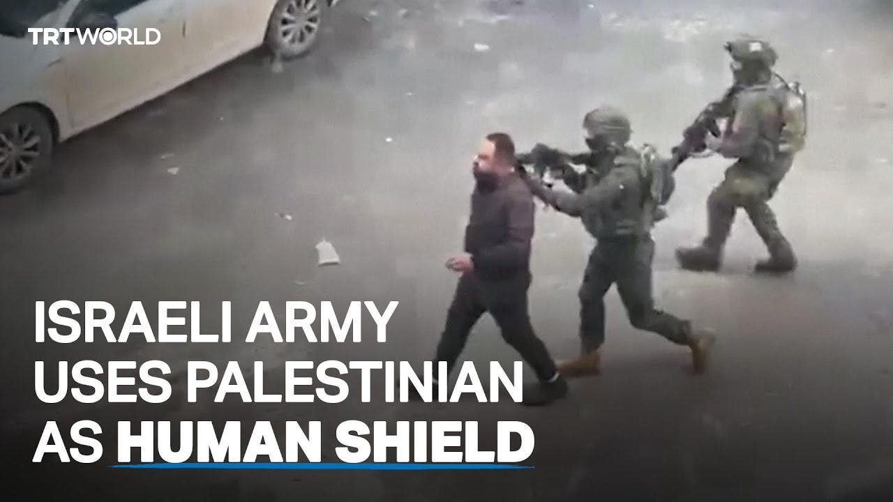 Palestinian man used as human shield by Israeli forces Palestinian man used as human shield by Israeli forces