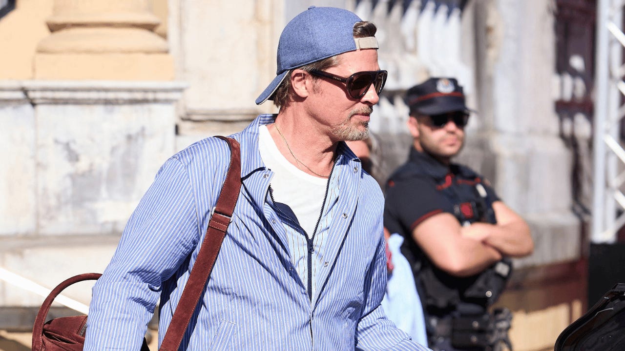 Image of The Oscar winner swapped his three-piece suit for a loose-fitting striped set as he departed his hotel in Spain. Image of The Oscar winner swapped his three-piece suit for a loose-fitting striped set as he departed his hotel in Spain.