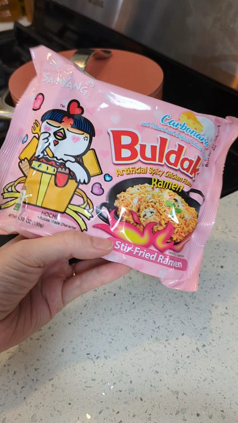 Buldak carbonara packet being opened, cooked, sauce packets mixed and finished noodles raised with chopsticks from the bowl.