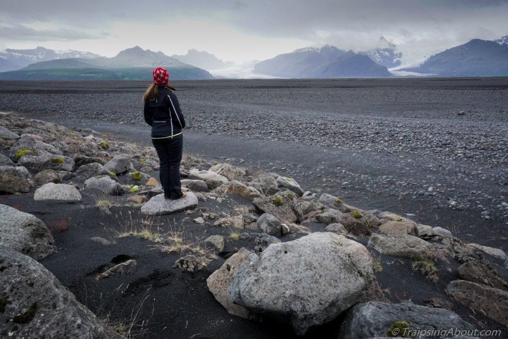 Chelsea contemplates whether hiking across a glacial moraine at midnight is a good idea. Chelsea contemplates whether hiking across a glacial moraine at midnight is a good idea.