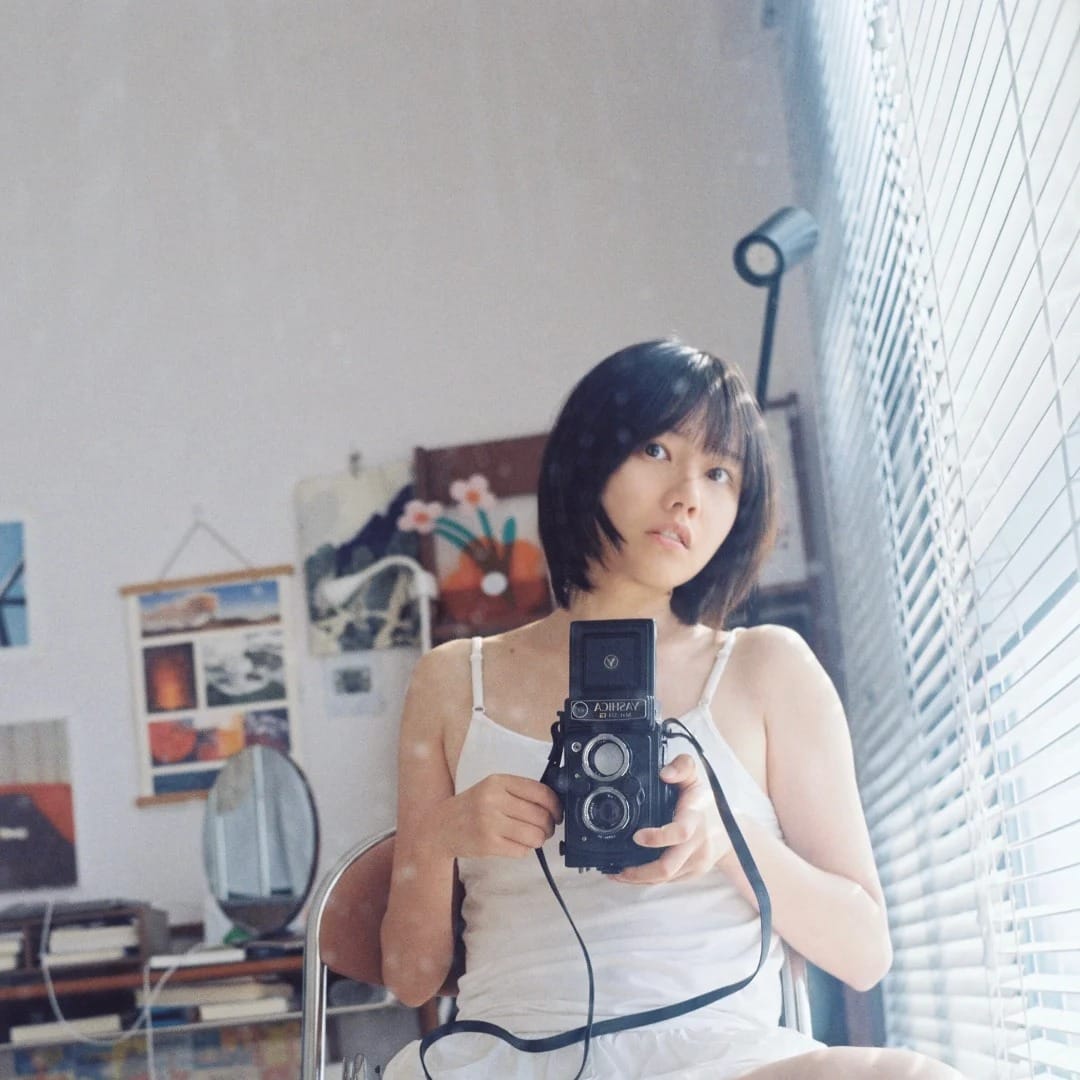 她和她的胶片相机