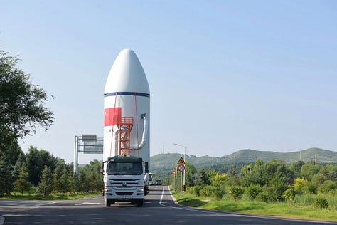 The first-stage and fairing of the Long March 6A heading to Launch Complex 9A.