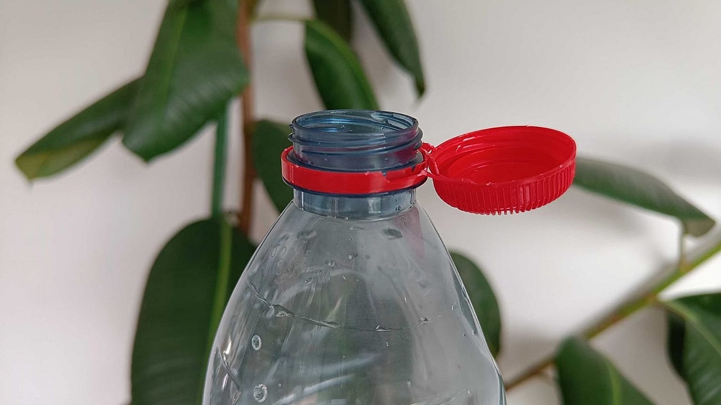 What's behind the new attached bottle caps? Inside the EU directive causing drink spills everywhere What's behind the new attached bottle caps? Inside the EU directive causing drink spills everywhere