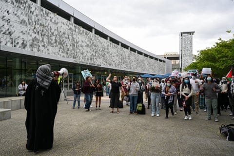 people holding signs