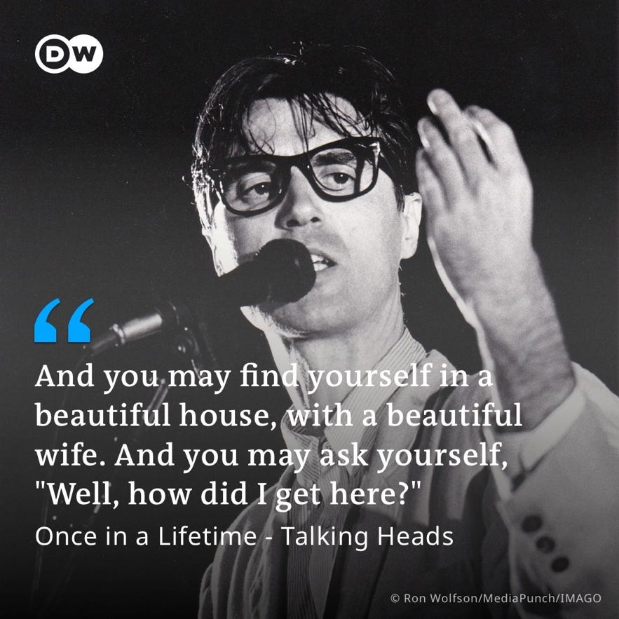 A person with glasses and a microphone

Description automatically generated with low confidence