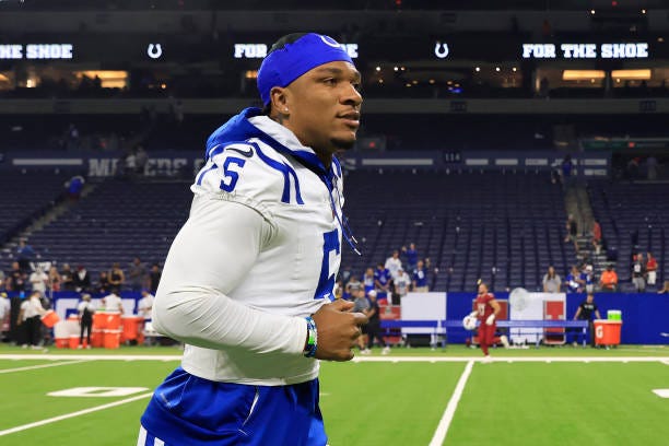 Anthony Richardson of the Indianapolis Colts runs off the field after the game against the Arizona Cardinals at Lucas Oil Stadium on August 17, 2024...