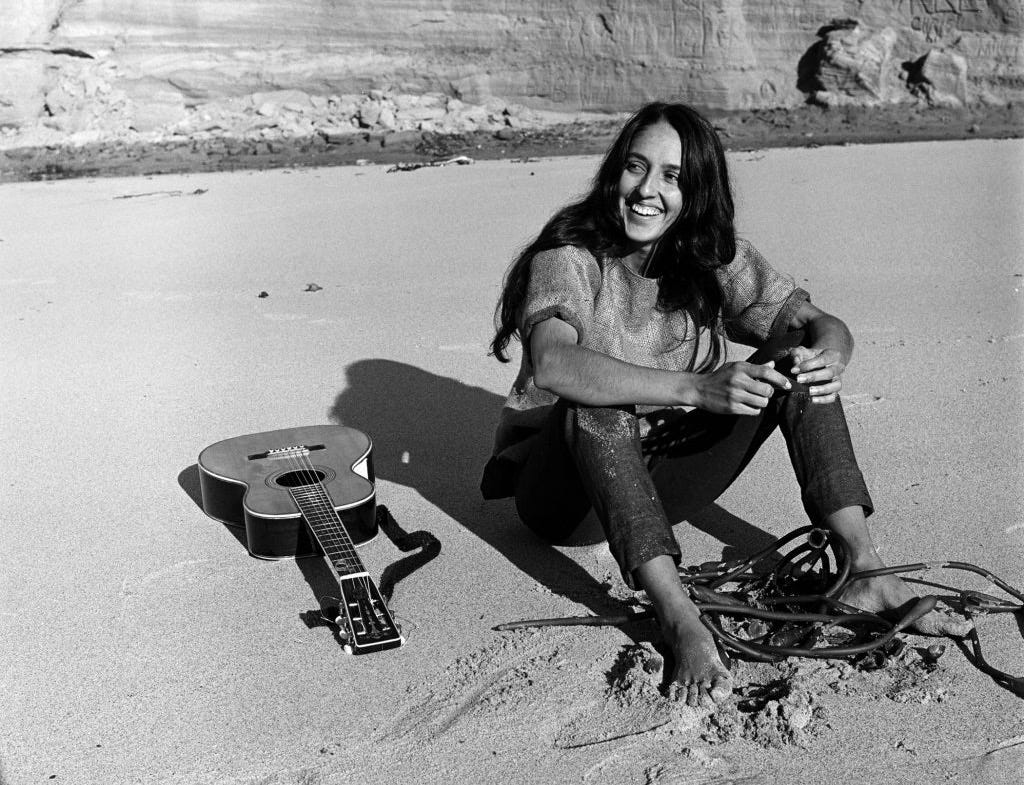 Folk singer Joan Baez on the beach near her home in Carmel, California, in 1962. Folk singer Joan Baez on the beach near her home in Carmel, California, in 1962.