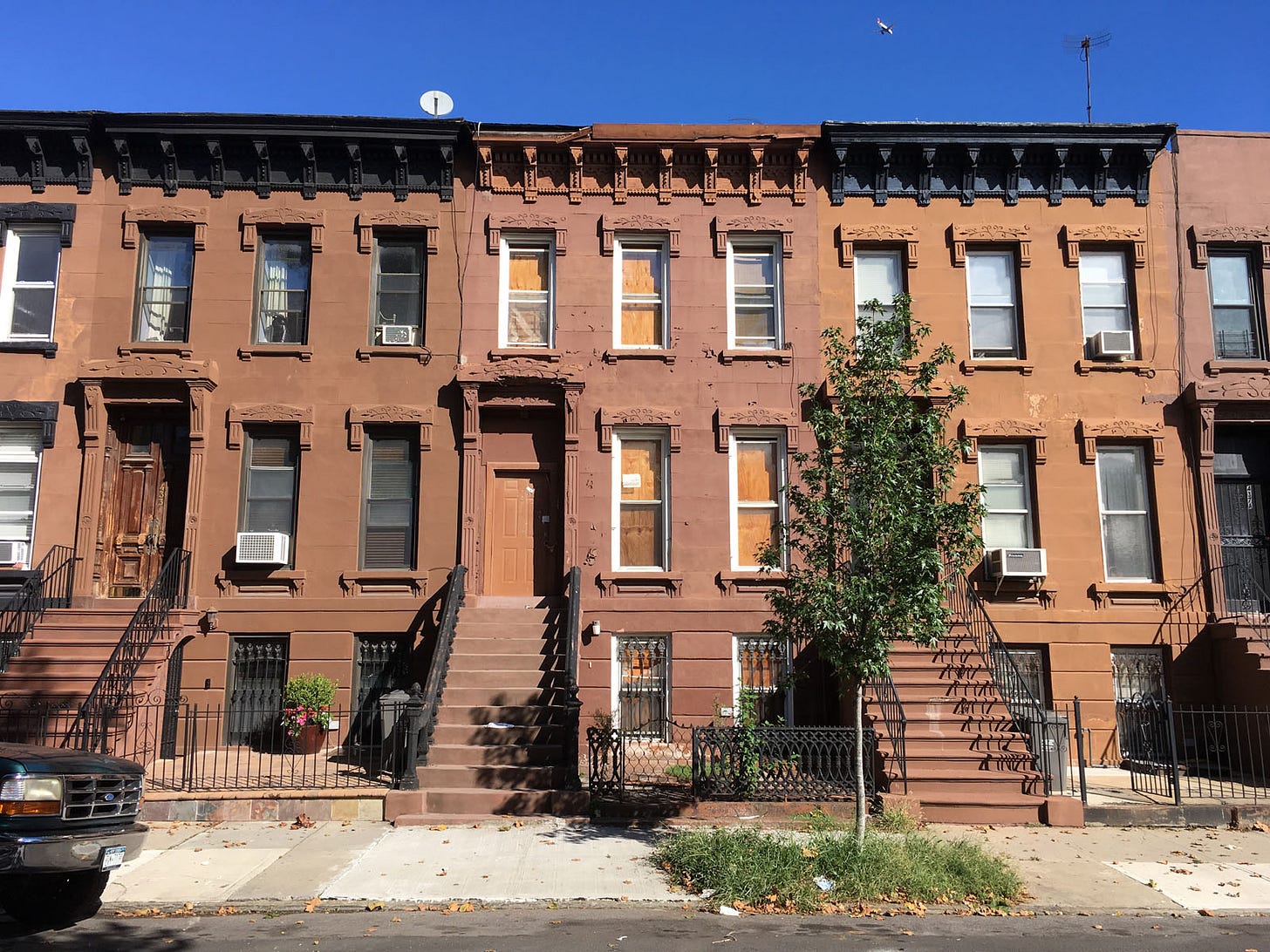 row of stone townhouses
