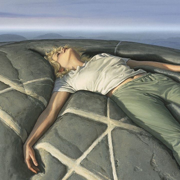 LEFT: Figure detail from GRAVITY featuring a woman in white t-shirt and drab green sweatpants sinking back into a mound of solid gray rock. The surface is marked with curving and intersecting lines that echo a similar contrail hidden mostly behind clouds high in the sky. RIGHT: Close detail from GRAVITY featuring a woman sinking back into a mound of solid gray rock. Her eyes are closed and her face is turned up to the sky.