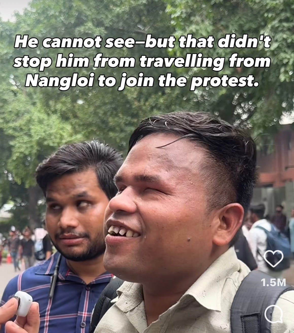 Two blind men with one of them speaking into a mic. Caption reads, “he cannot see but that did not stop him from travelling from Nangloi to the protest. Two blind men with one of them speaking into a mic. Caption reads, “he cannot see but that did not stop him from travelling from Nangloi to the protest.