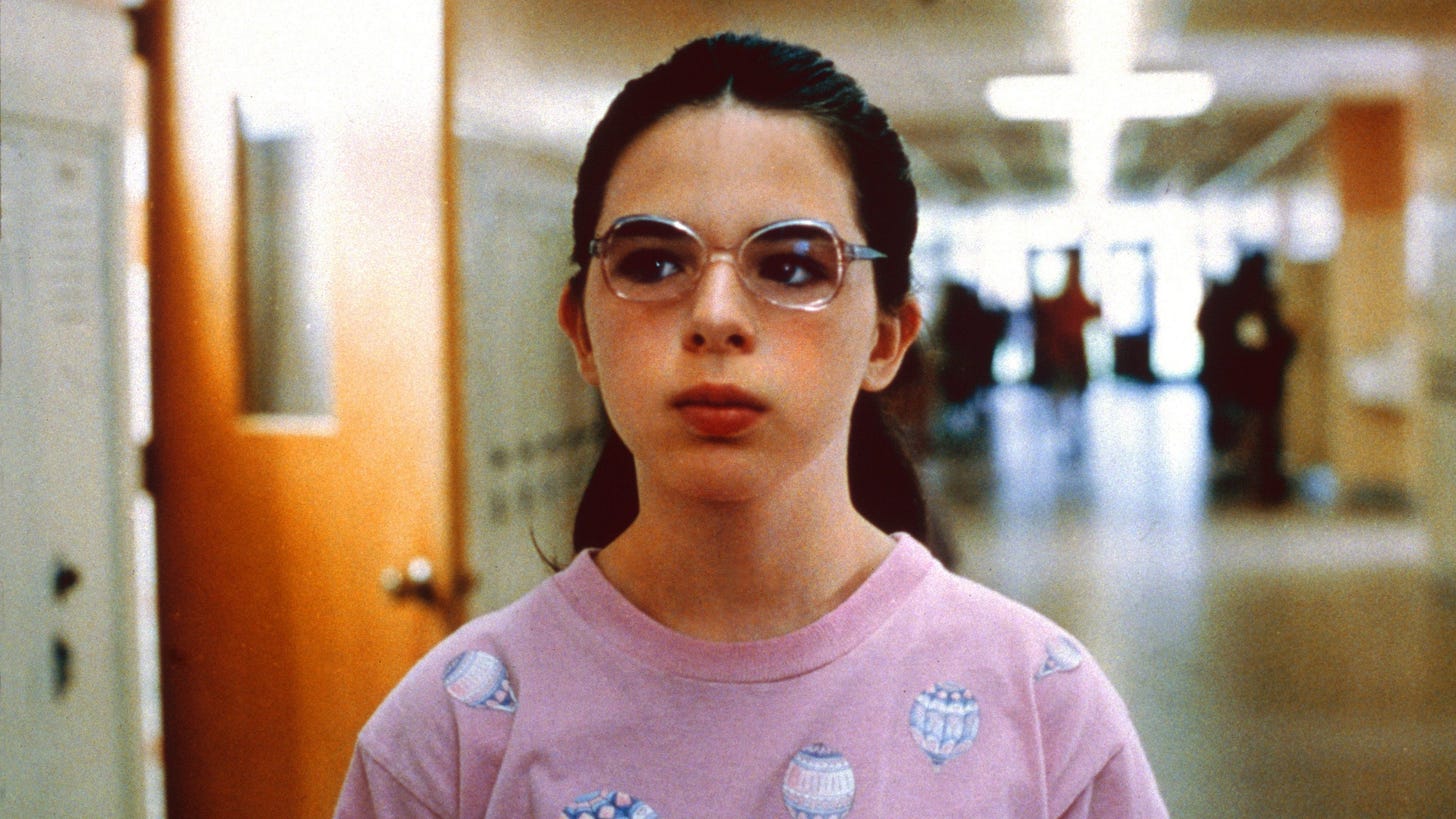Welcome to the Dollhouse | Still features Heather Matarazzo as Dawn Wiener within a school hallway.