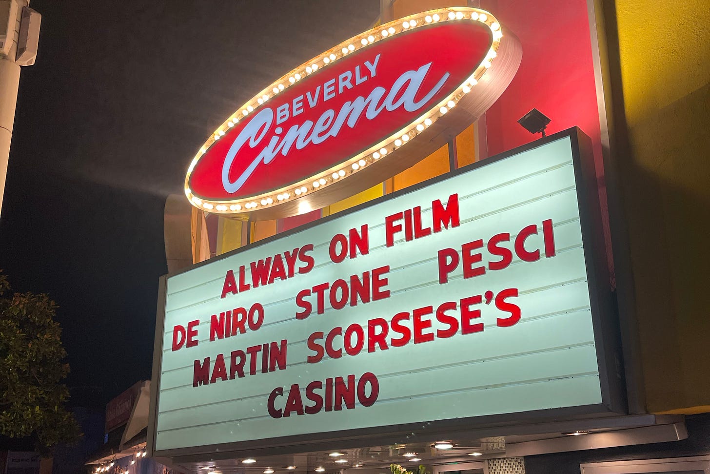 Image of the marquee at the New Beverly Cinema in Los Angeles. It reads “Always on film. De Niro, Stone, Pesci. Martin Scorsese’s Casino.”
