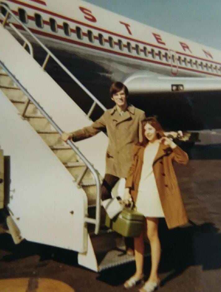 Mike and Mary of the Anchorage Memories Club, board a plane in Anchorage, Alaska.