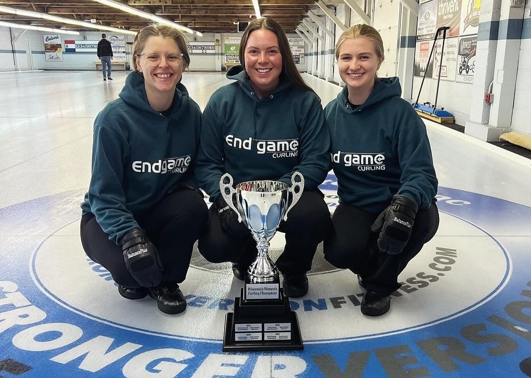 May be an image of 4 people, people playing hockey, people skating and text