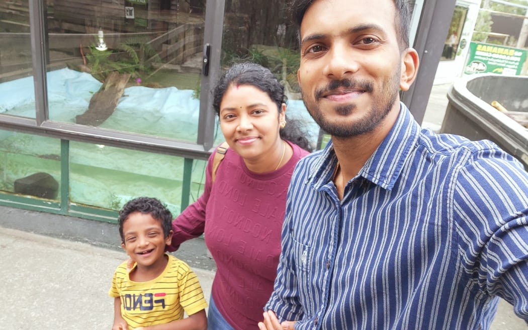 Nelson elder care nurse Nithin Mankeel with his wife Aparna Jayandhan Geetha and five-year-old son Aidhan Nithin.