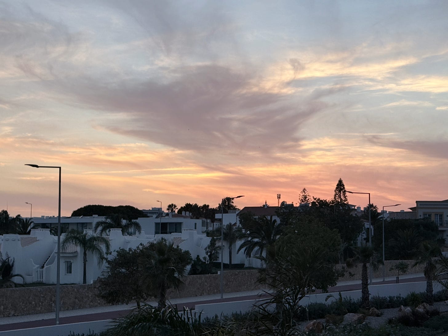 Sunset over white villas Sunset over white villas