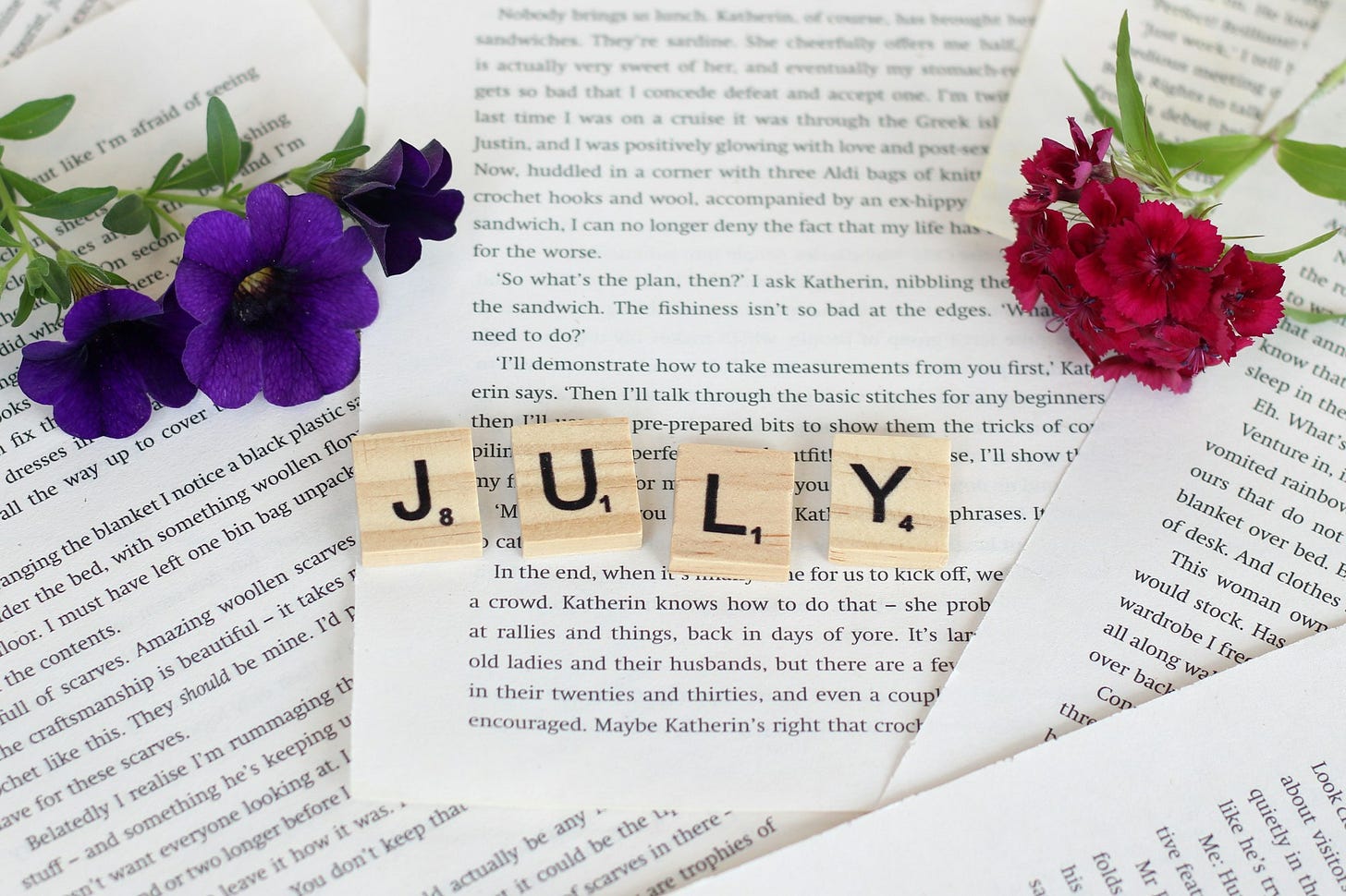 JULY spelled in scrabble letters