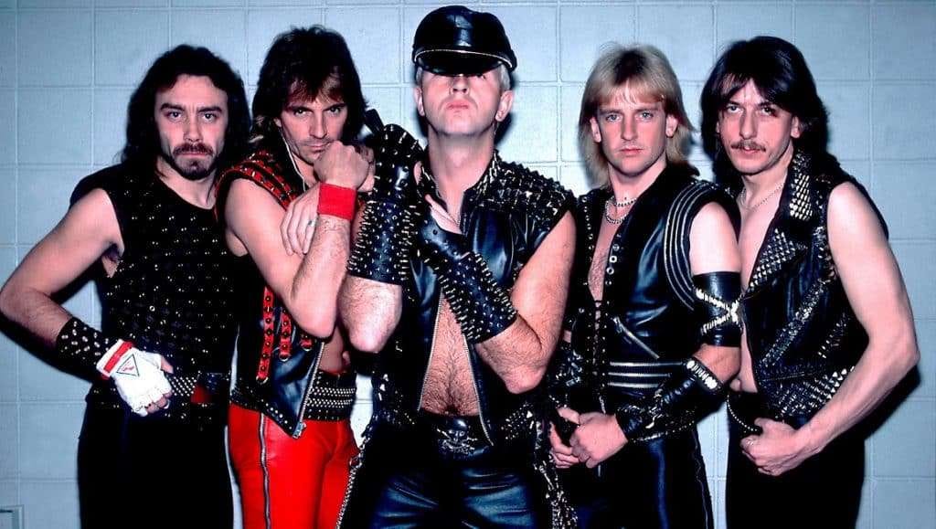 judas priest,judas priest tour,judas priest songs,judas priest members,judas priest band,rob halford,judas priest facts,judas priest bio,judas priest biography,judas priest heavy metal,judas priest singer,judas priest lead singer,judas priest guitar,judas priest guitarist,judas priest trial,judas priest stained class,judas priest controversy,judas priest 80s,rob halford gay,ian hill,kk downing,glenn tipton,scott travis,judas priest crazy facts,crazy judas priest facts,things you didn't know about judas priest,where did judas priest get their name,rob halford motorcycle accident,heavy metal fashion,judas priest rock and roll hall of fame,heavy metal parking lot,tim ripper owens,rock star movie,judas priest the simpsons,rob halford sober,how long has rob halford been sober,judas priest bob dylan, JUDAS PRIEST’s Enduring Legacy: 13 Fascinating Facts About The Heavy Metal Gods