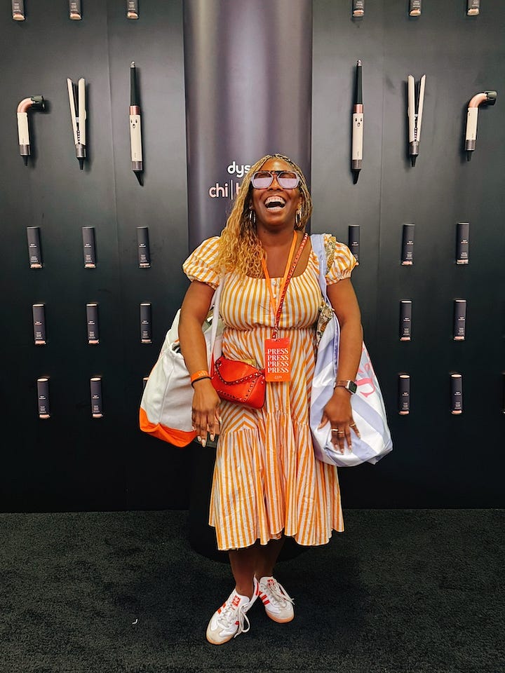 Amber Venerable explores the booths at Ulta Beauty World