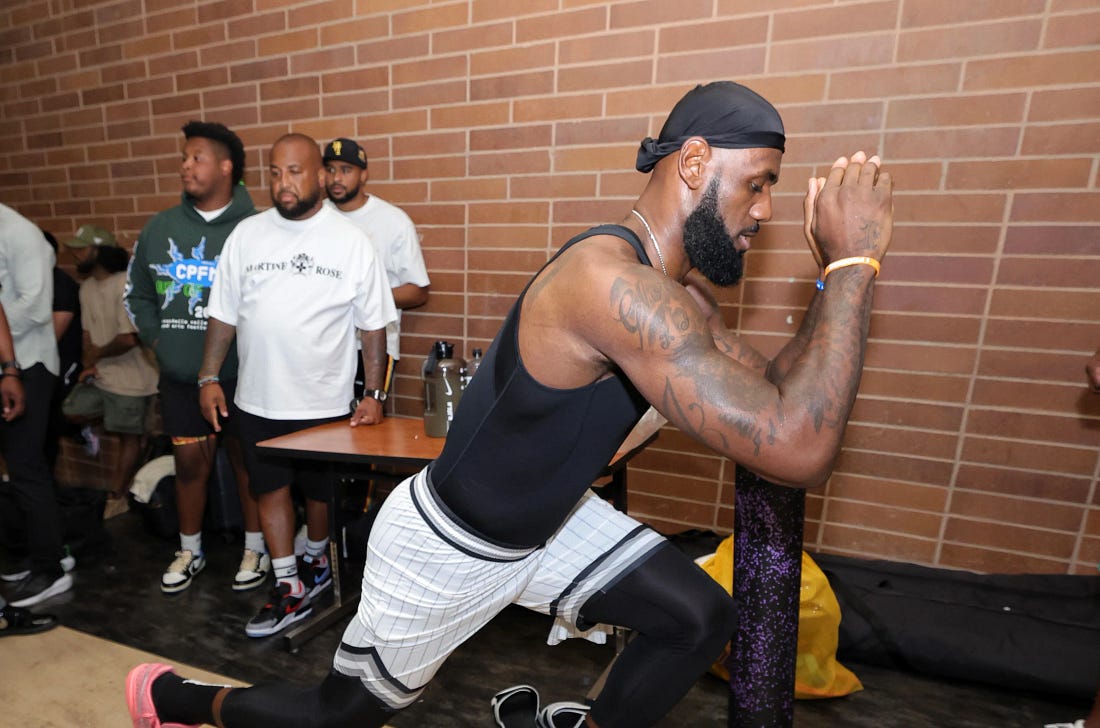 LeBron James training intensely, used as a metaphor for startup founders and employees sharpening skills through long hours.