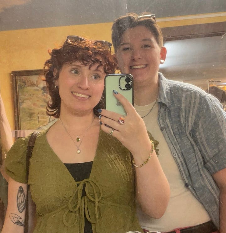 a queer couple posing for a graduation photo; the same couple in a mirror selfie