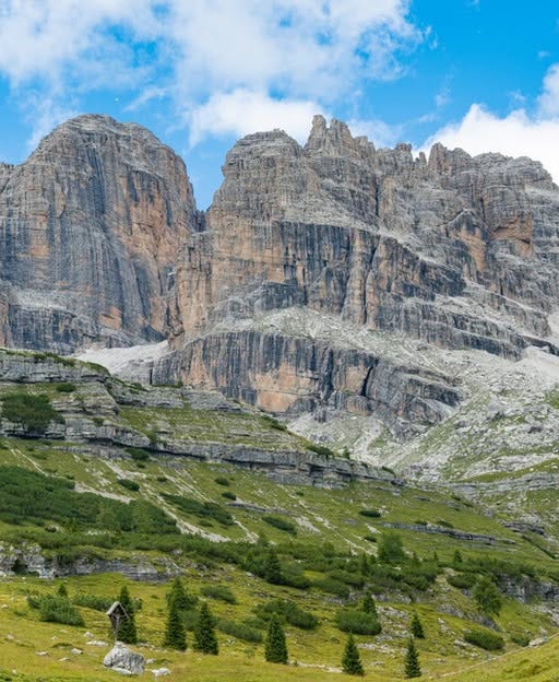 May be an image of the Tre Cime di Lavaredo and mountain