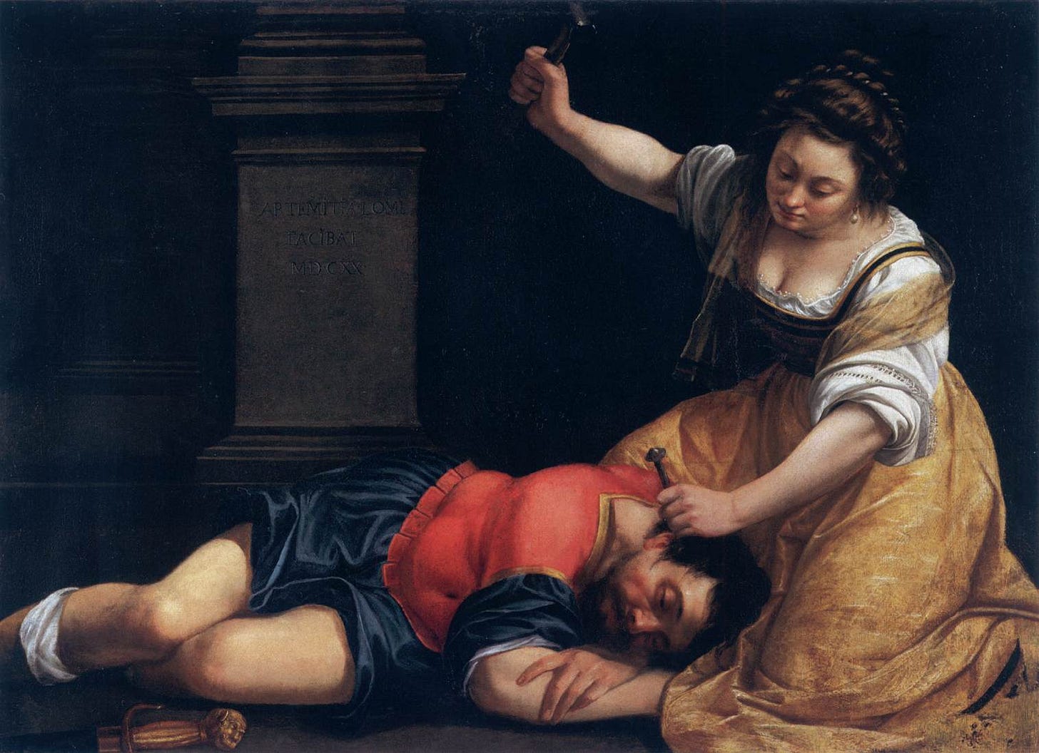 A woman in a gold dress kneels over a sleeping soldier, holding a tent peg to his temple with one hand and raising a hammer with the other.