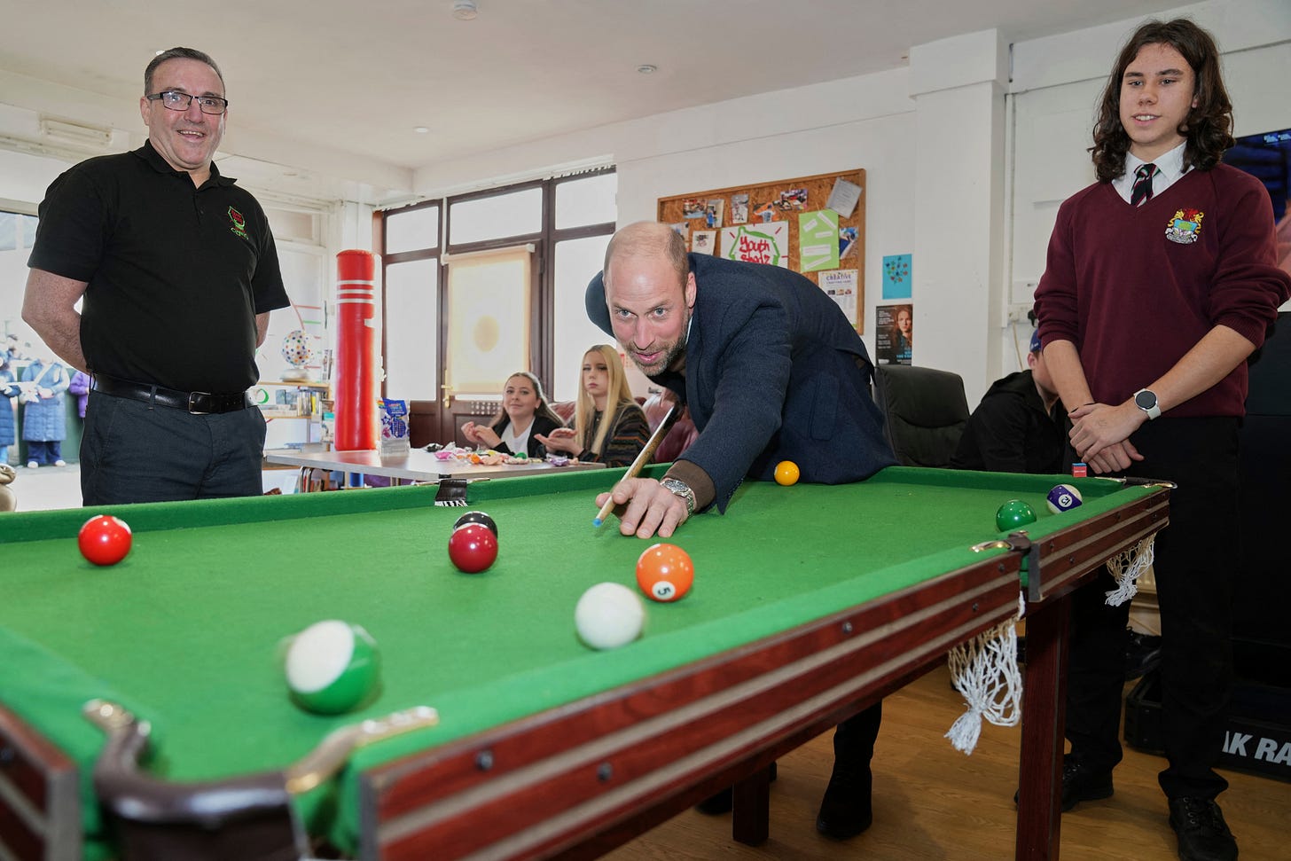 Prince William playing pool