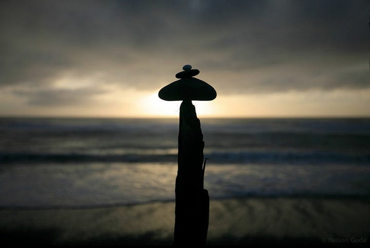 Photographs of balanced objects by Nelson Guda