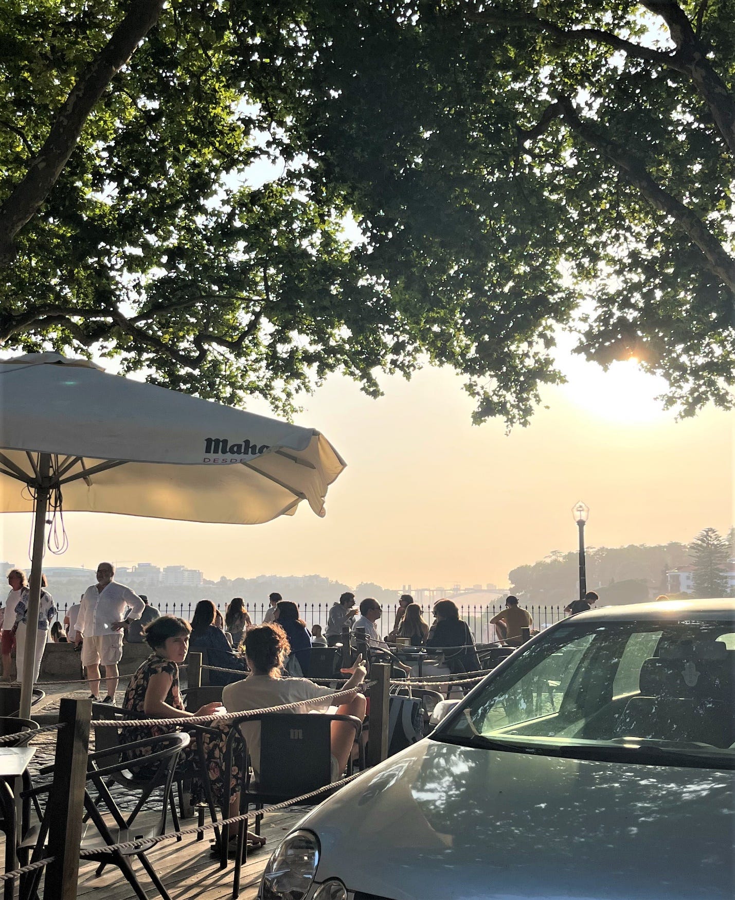 A group of people sitting at a table

Description automatically generated